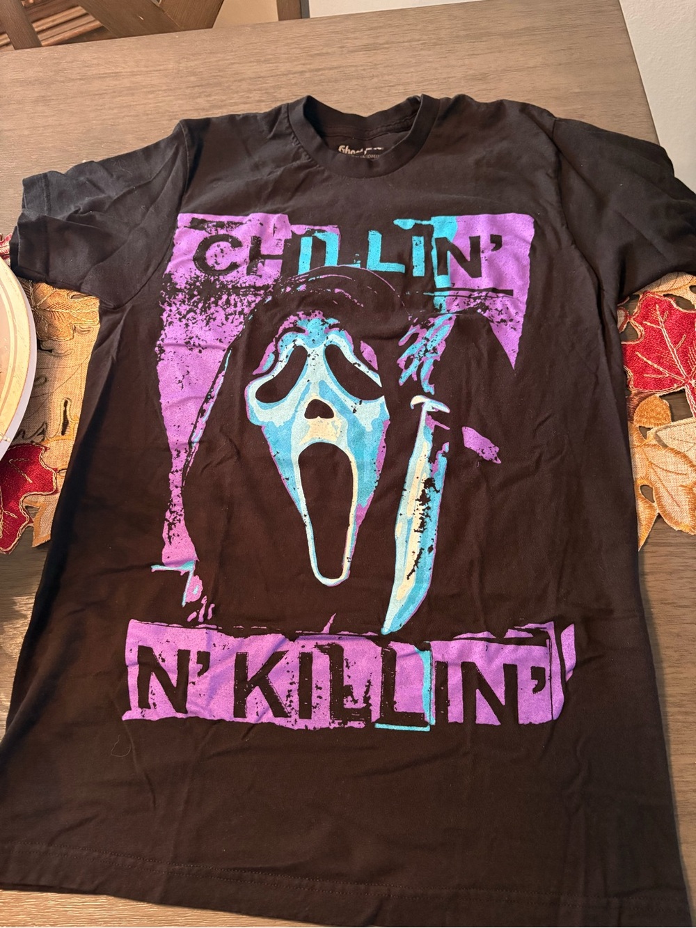 Hot Topic Black Tee with Purple & Teal Scream Graphic